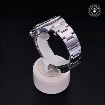 Rolex Certified Pre-owned Submariner M16610LV-0002 front on black background