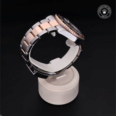 Rolex Certified Pre-owned GMT II M126711CHNR-0002 front on black background