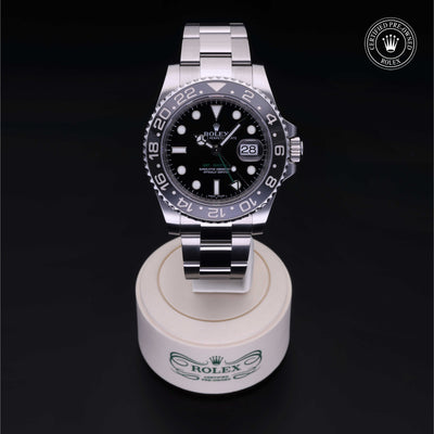 Rolex Certified Pre-owned GMT M116710LN-0001 front on black background