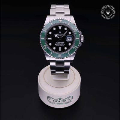 Rolex Certified Pre-owned Submariner M126610LV-0002 front on black background