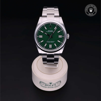Rolex Certified Pre-owned Oyster Perpetual M124300-0005 front on black background