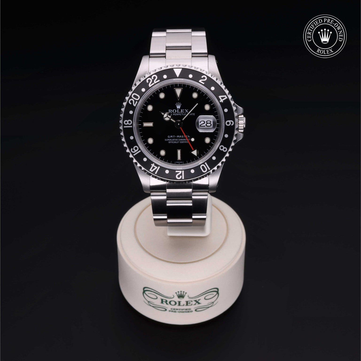 Rolex Certified Pre-owned GMT M16700LN-0001 front on black background