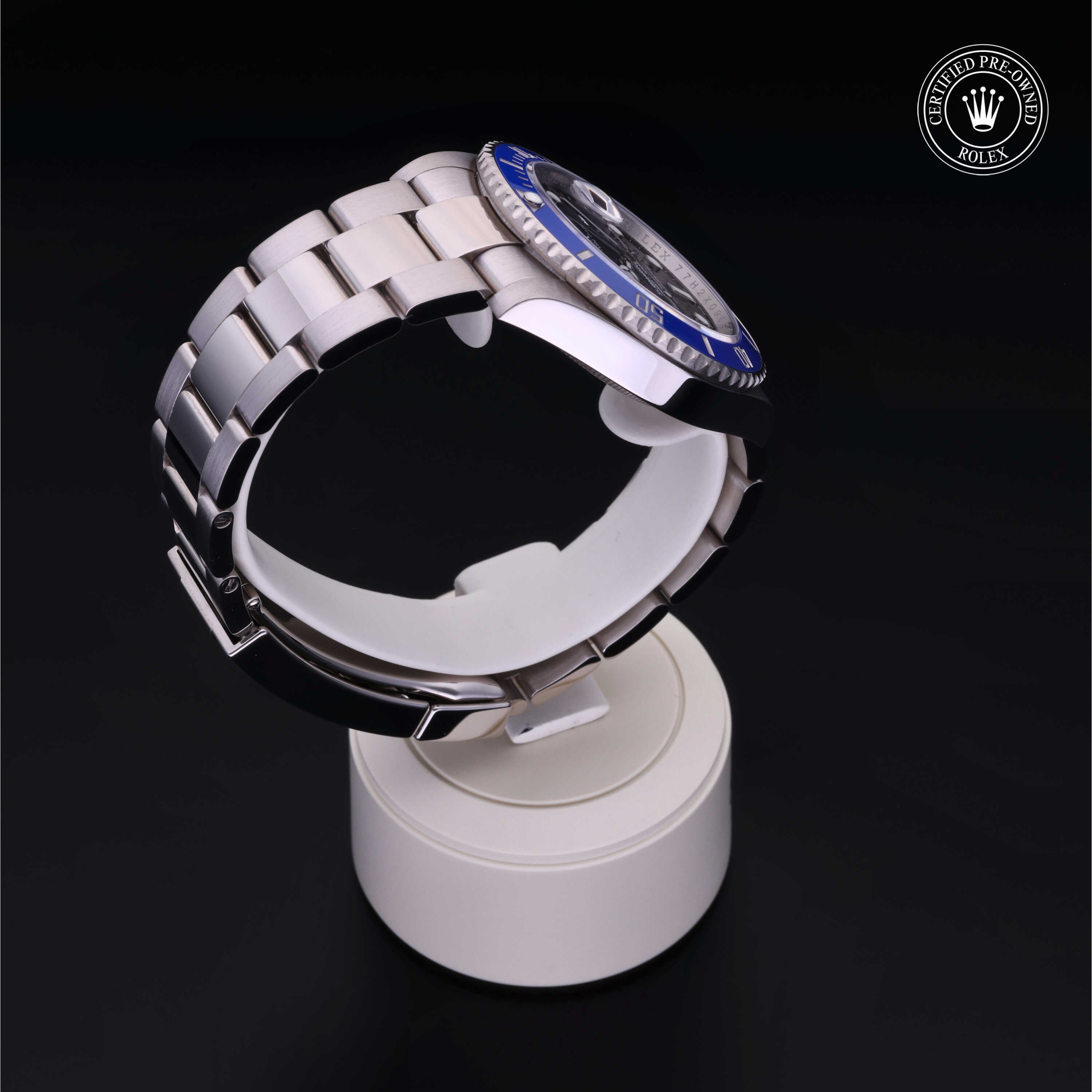 Rolex Certified Pre-owned Submariner M126619LB-0003 front on black background