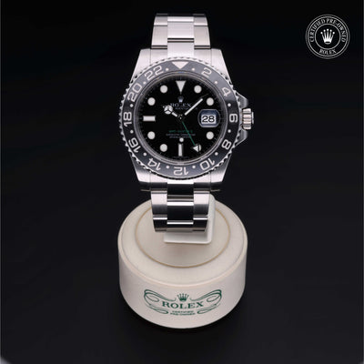 Rolex Certified Pre-owned GMT M116710LN-0001 front on black background