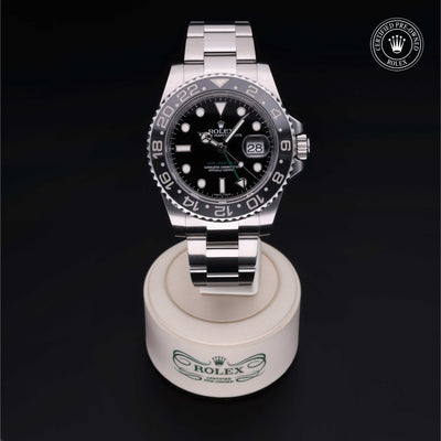 Rolex Certified Pre-owned GMT II M116710LN-0001 front on black background