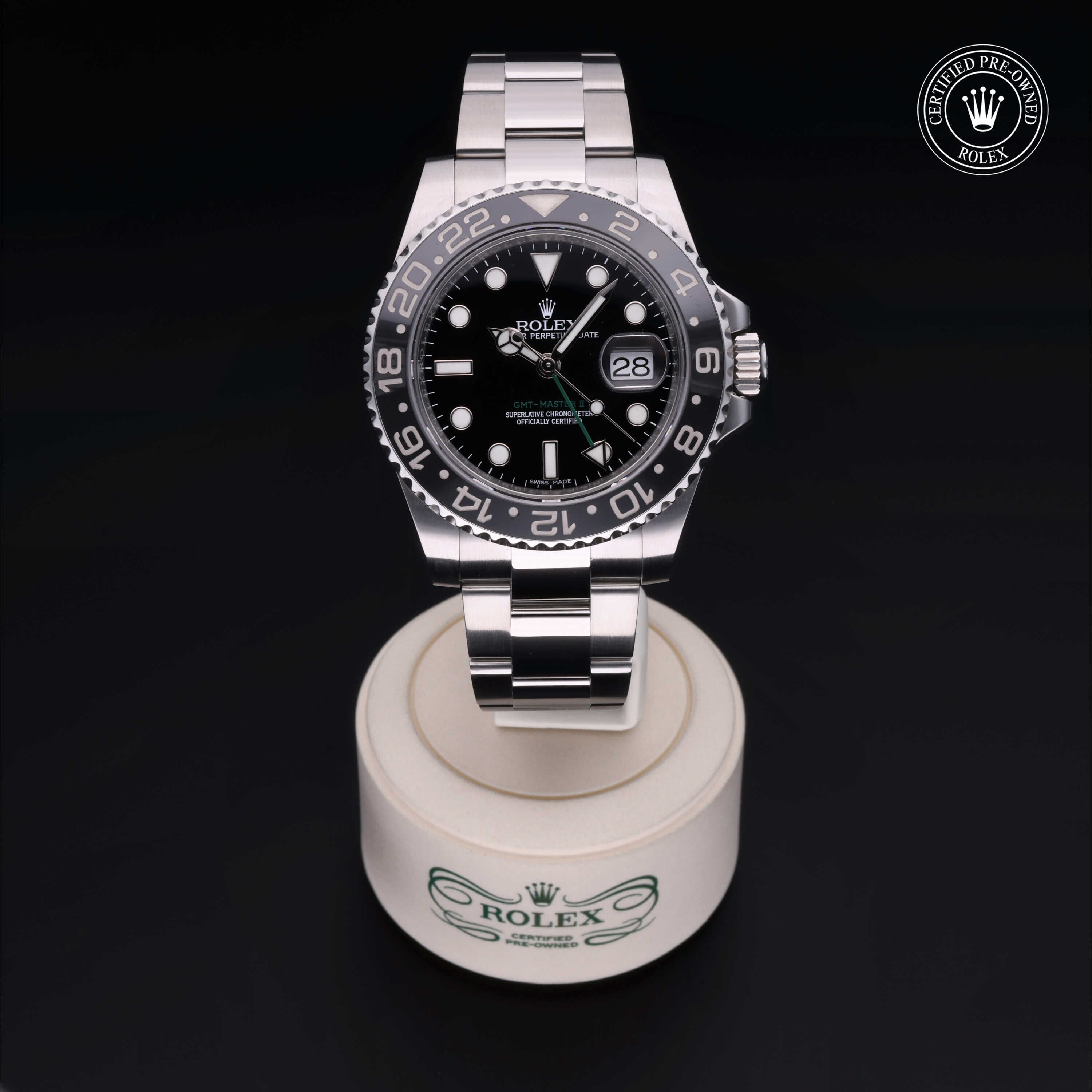 Rolex Certified Pre-owned GMT II M116710LN-0001 front on black background