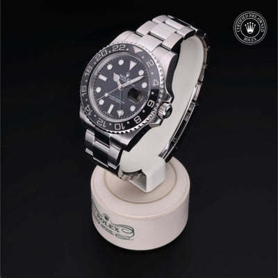 Rolex Certified Pre-owned GMT II M116710LN-0001 front on black background