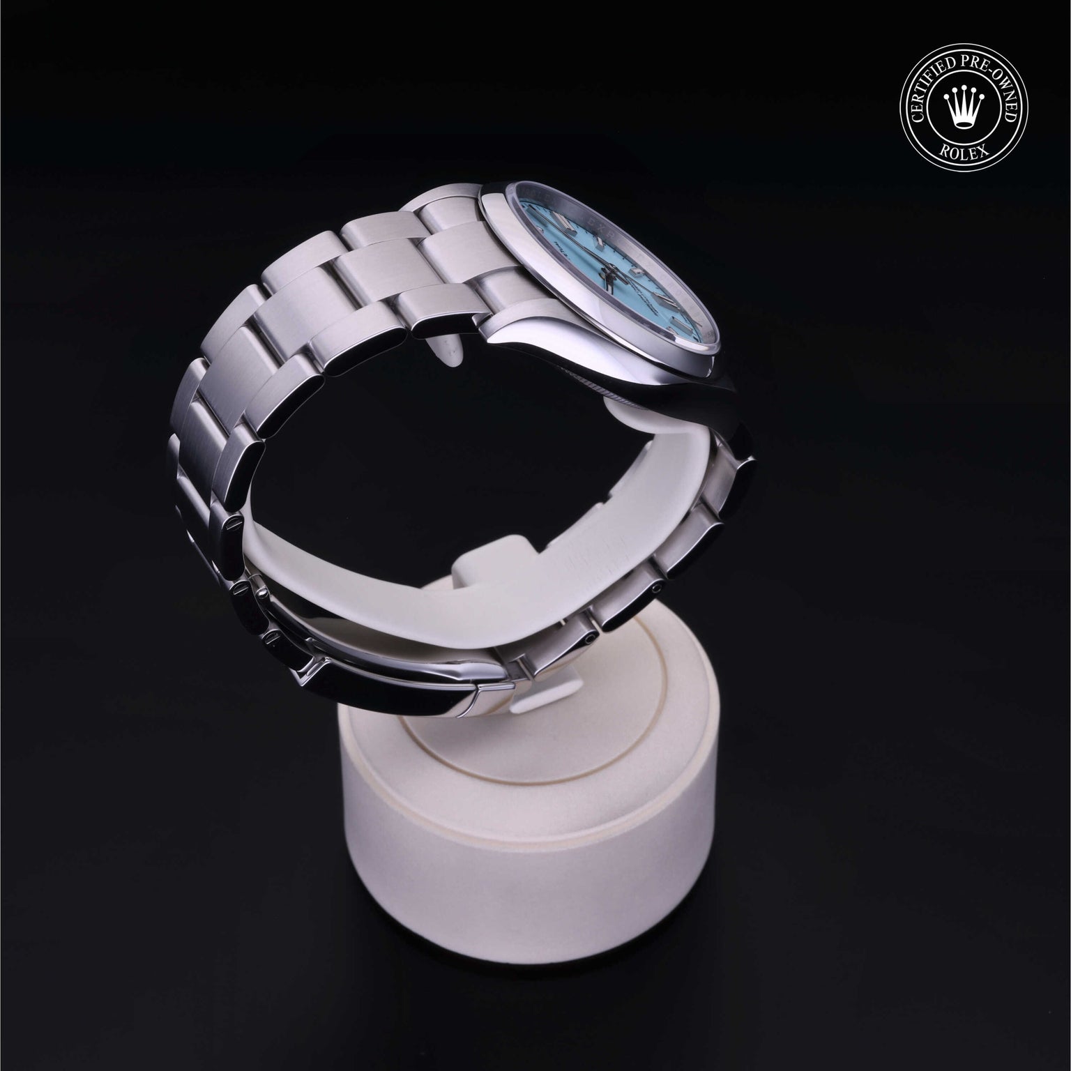 Rolex Certified Pre-owned Oyster Perpetual M126000-0006 front on black background