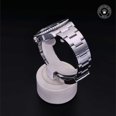 Rolex Certified Pre-owned Submariner M126610LN-0001 front on black background