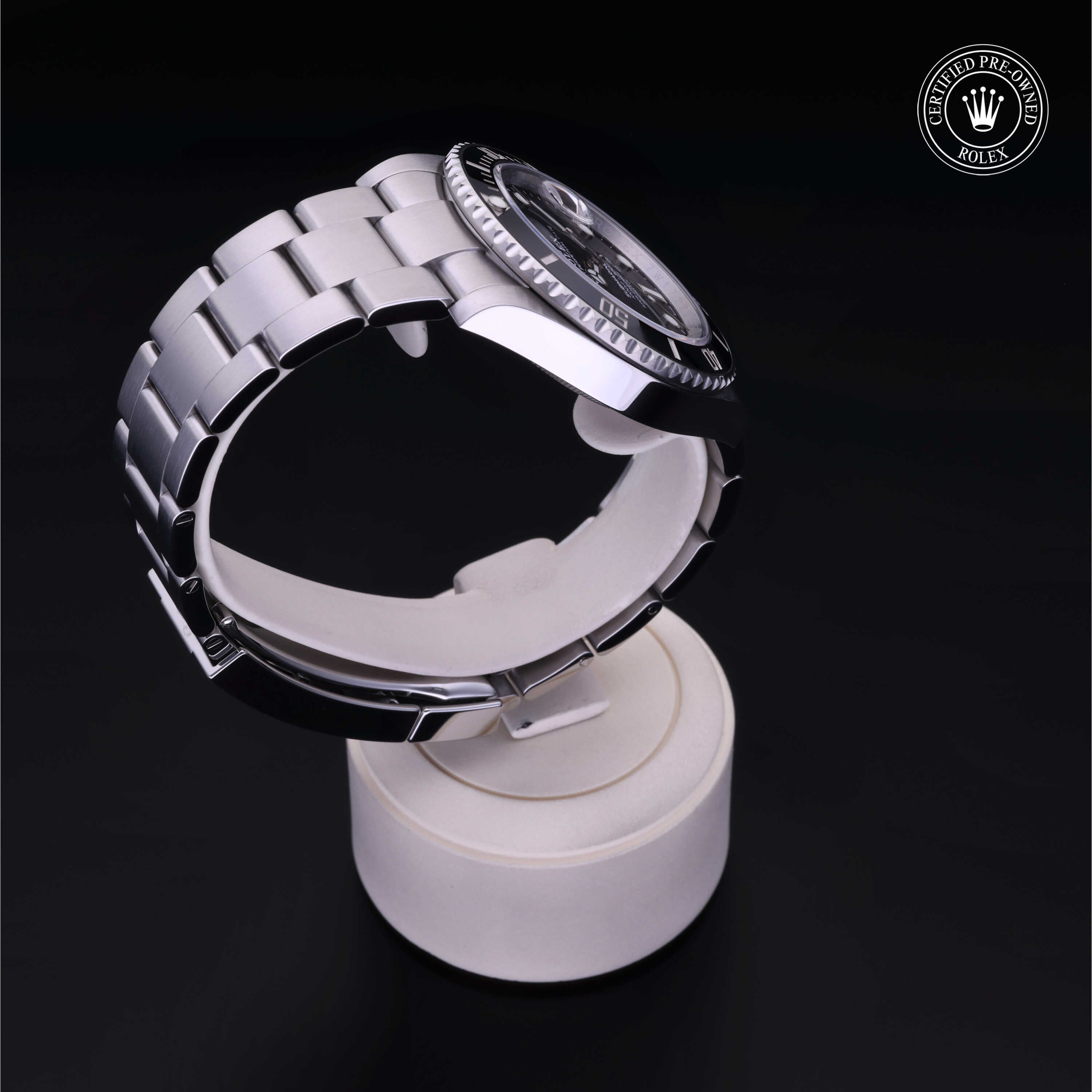 Rolex Certified Pre-owned Submariner M126610LN-0001 front on black background