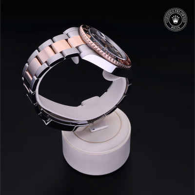 Rolex Certified Pre-owned GMT II M126711CHNR-0002 front on black background