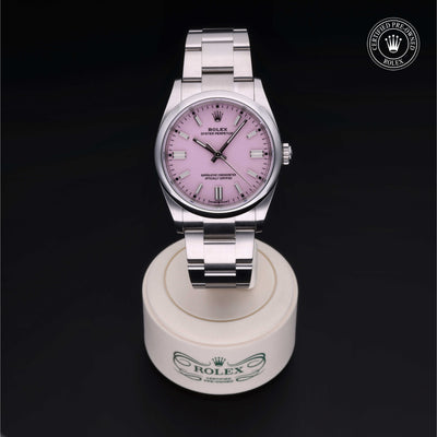 Rolex Certified Pre-owned Oyster Perpetual M126000-0008 front on black background