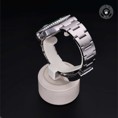 Rolex Certified Pre-owned Submariner M116610LV-0002 front on black background