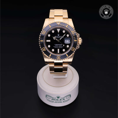 Rolex Certified Pre-owned Submariner M116618LN-0001 front on black background