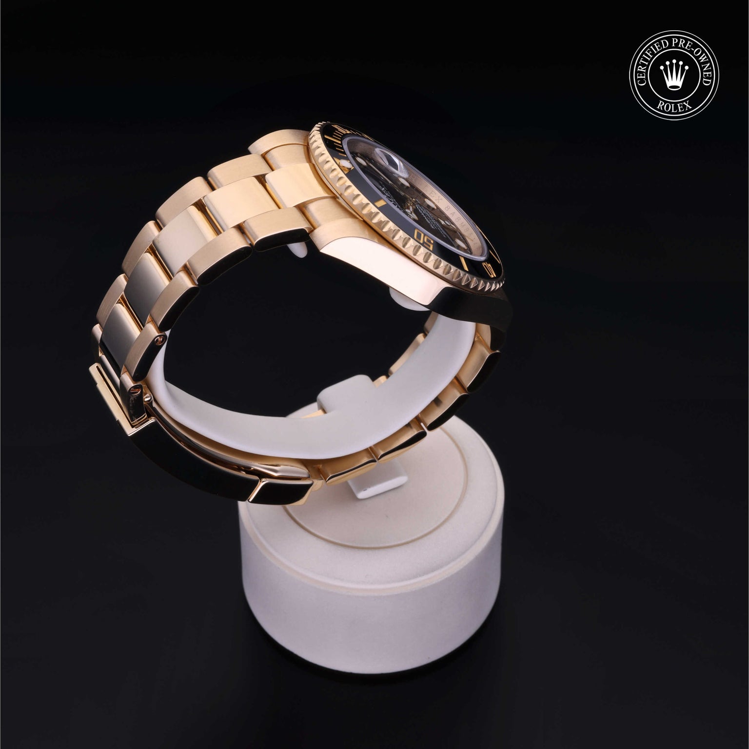 Rolex Certified Pre-owned Submariner M116618LN-0001 front on black background