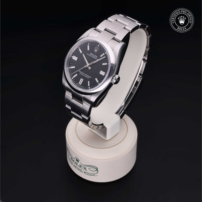 Rolex Certified Pre-owned Oyster Perpetual M126000-0002 front on black background