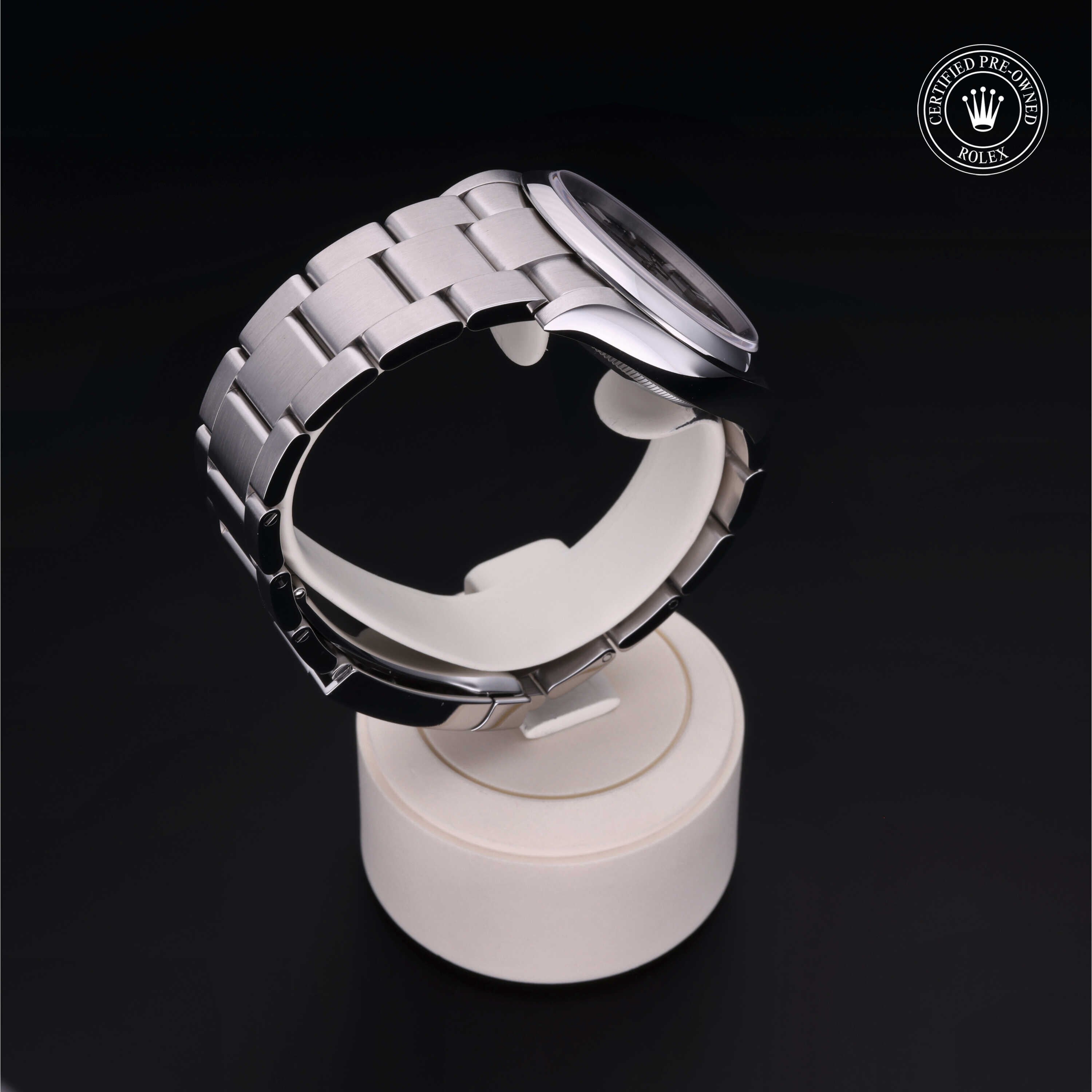 Rolex Certified Pre-owned Oyster Perpetual M126000-0002 front on black background