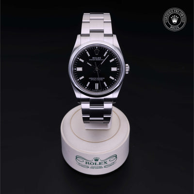 Rolex Certified Pre-owned Oyster Perpetual M126000-0014 front on black background