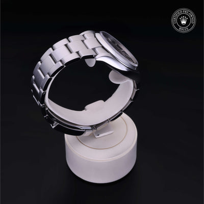 Rolex Certified Pre-owned Oyster Perpetual M126000-0014 front on black background