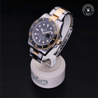 Rolex Certified Pre-owned Submariner M116613LN-0001 front on black background