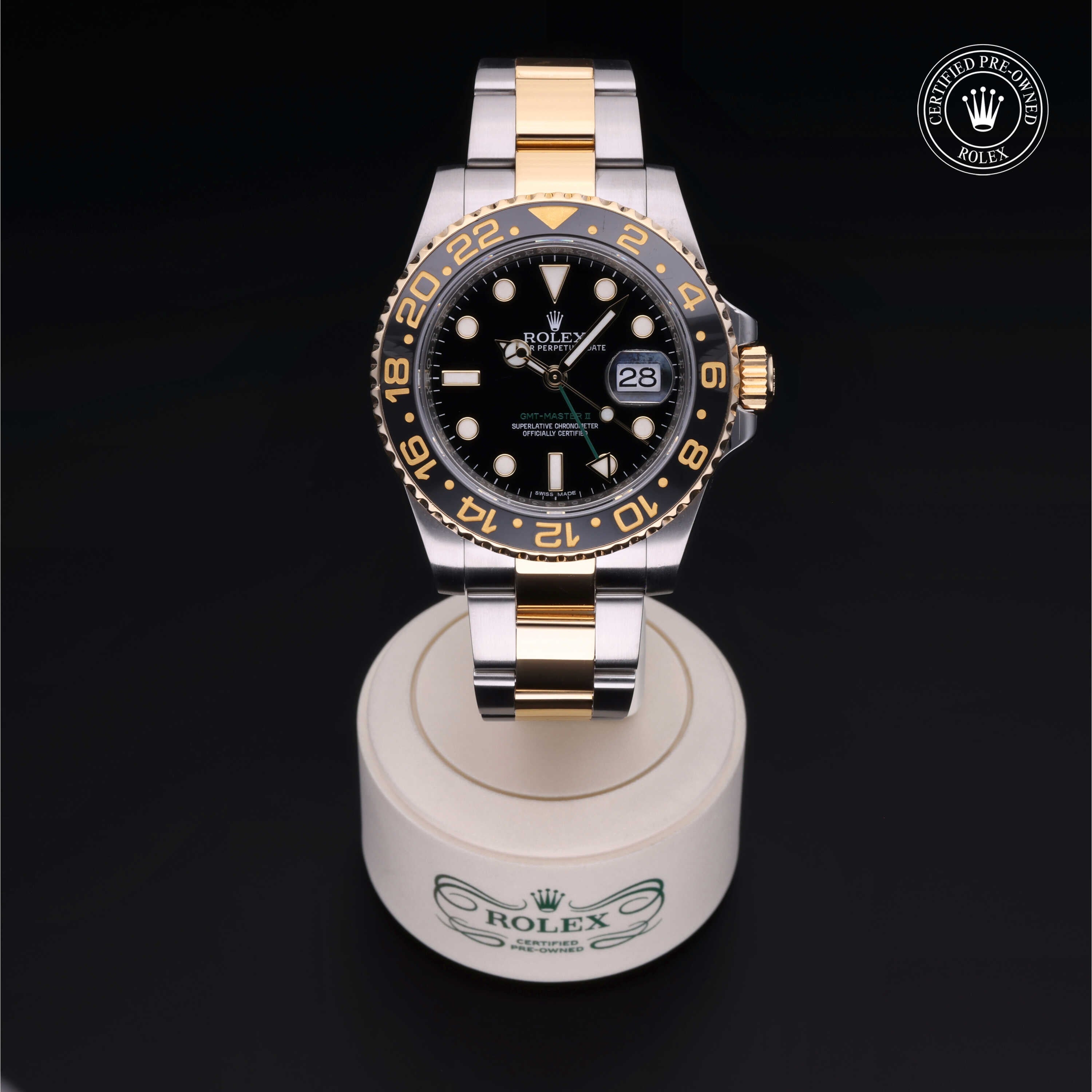 Rolex Certified Pre-owned GMT M116713LN-0001 front on black background