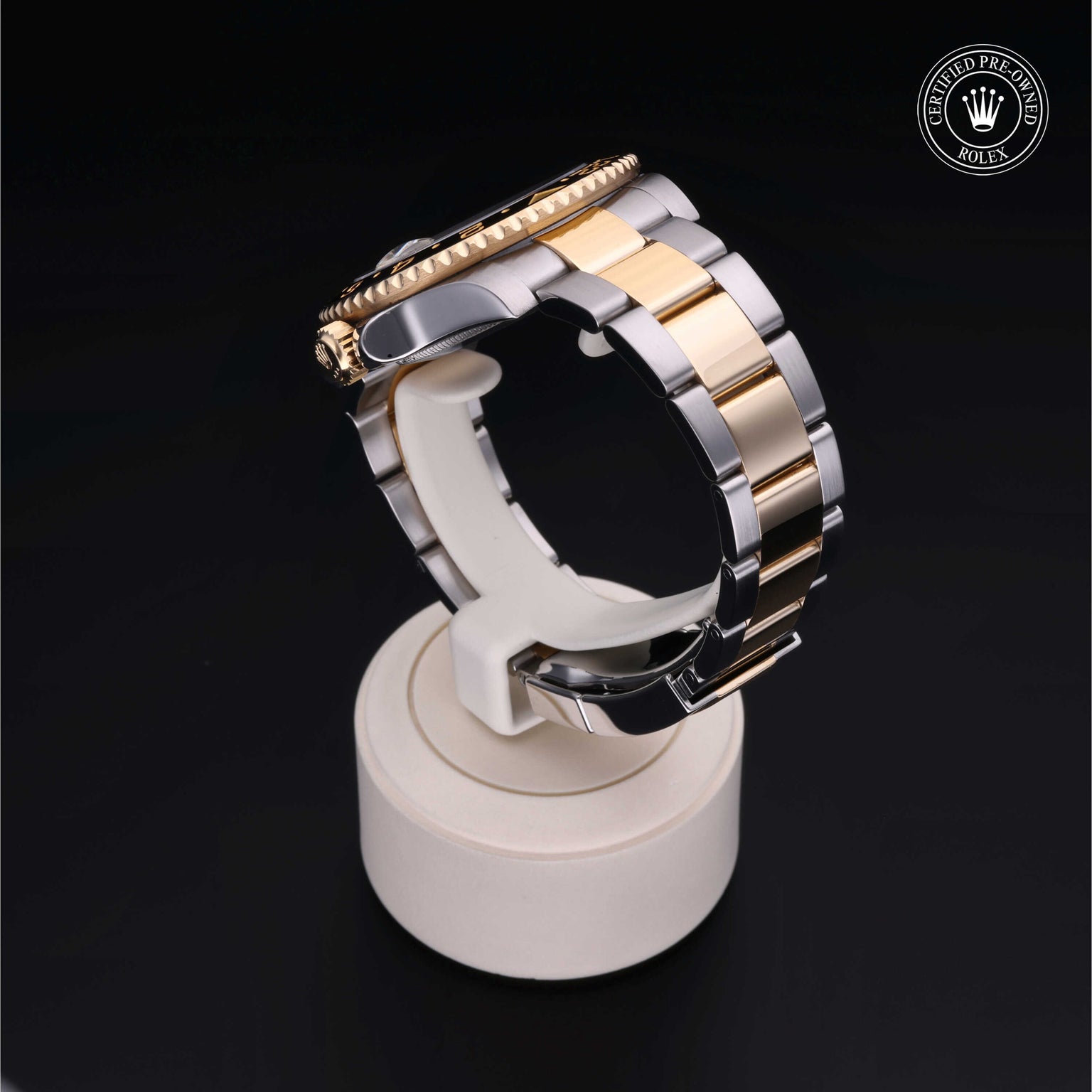 Rolex Certified Pre-owned GMT M116713LN-0001 front on black background