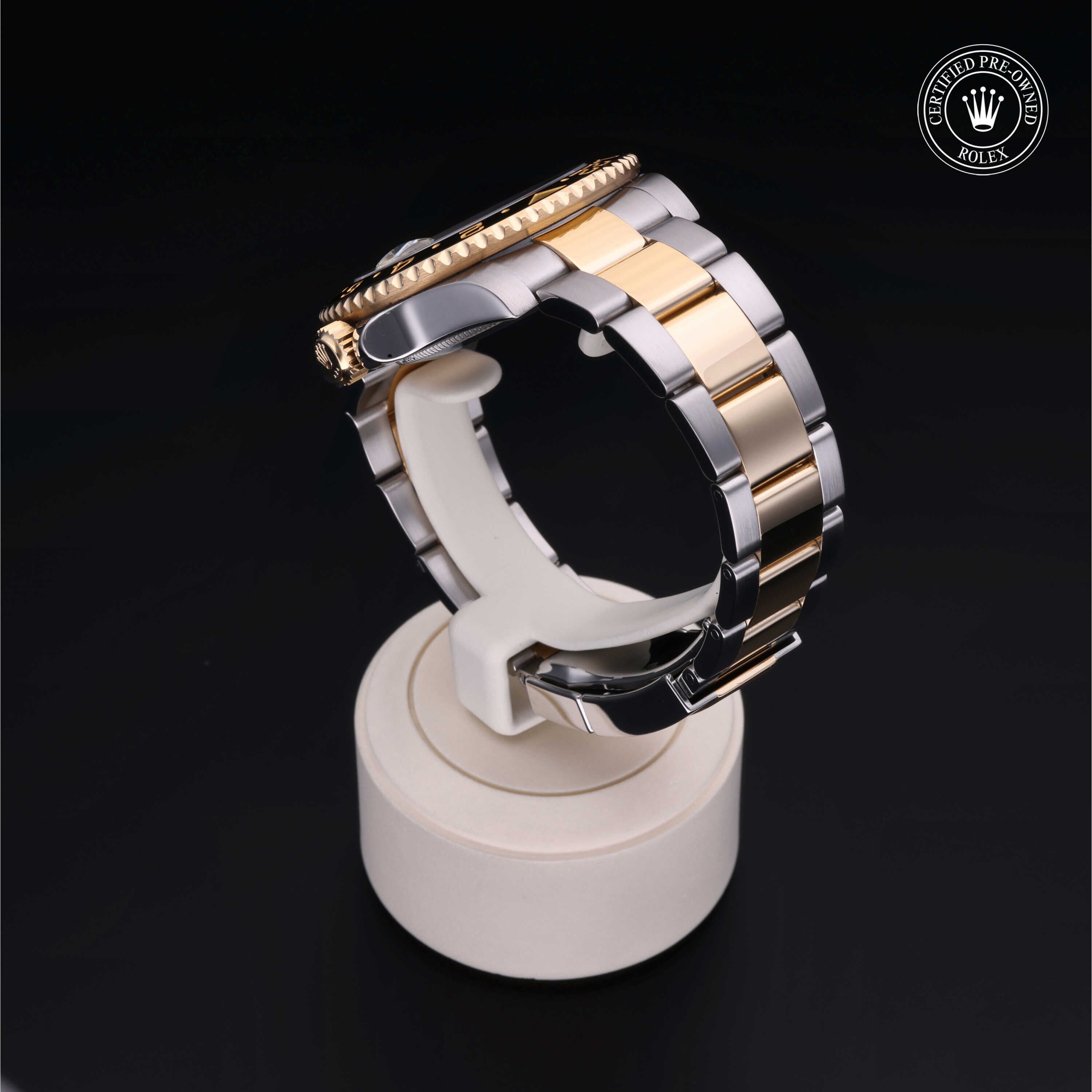 Rolex Certified Pre-owned GMT M116713LN-0001 front on black background