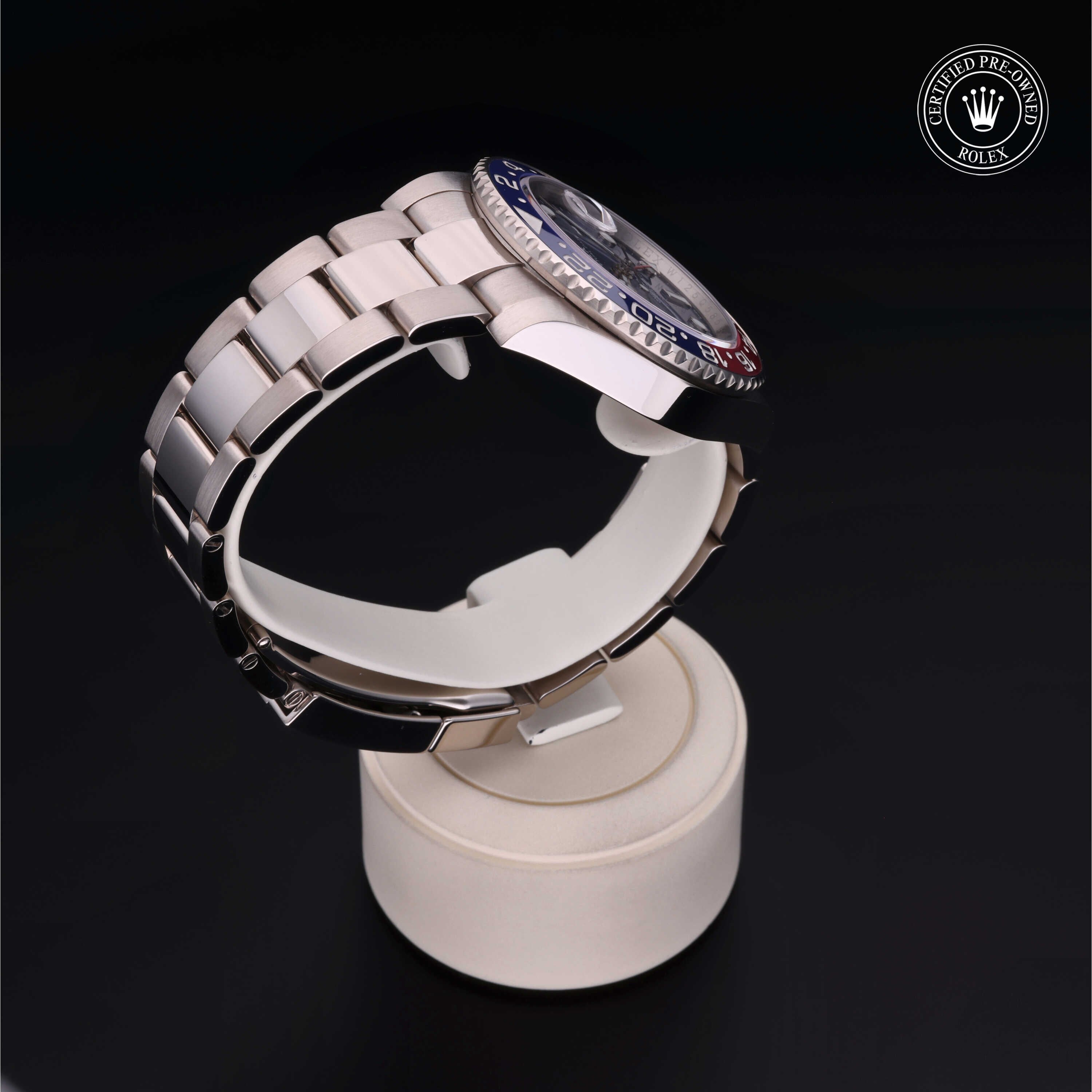 Rolex Certified Pre-owned GMT M126719BLRO-0003 front on black background