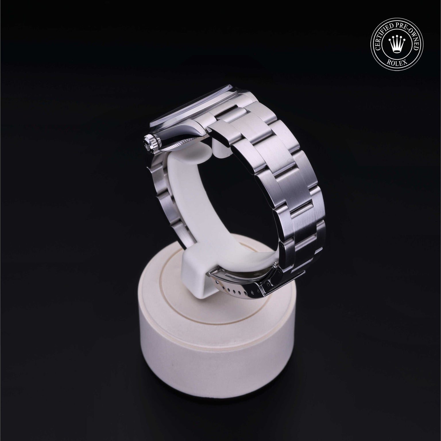 Rolex Certified Pre-owned Oyster Perpetual M77080-0022 front on black background