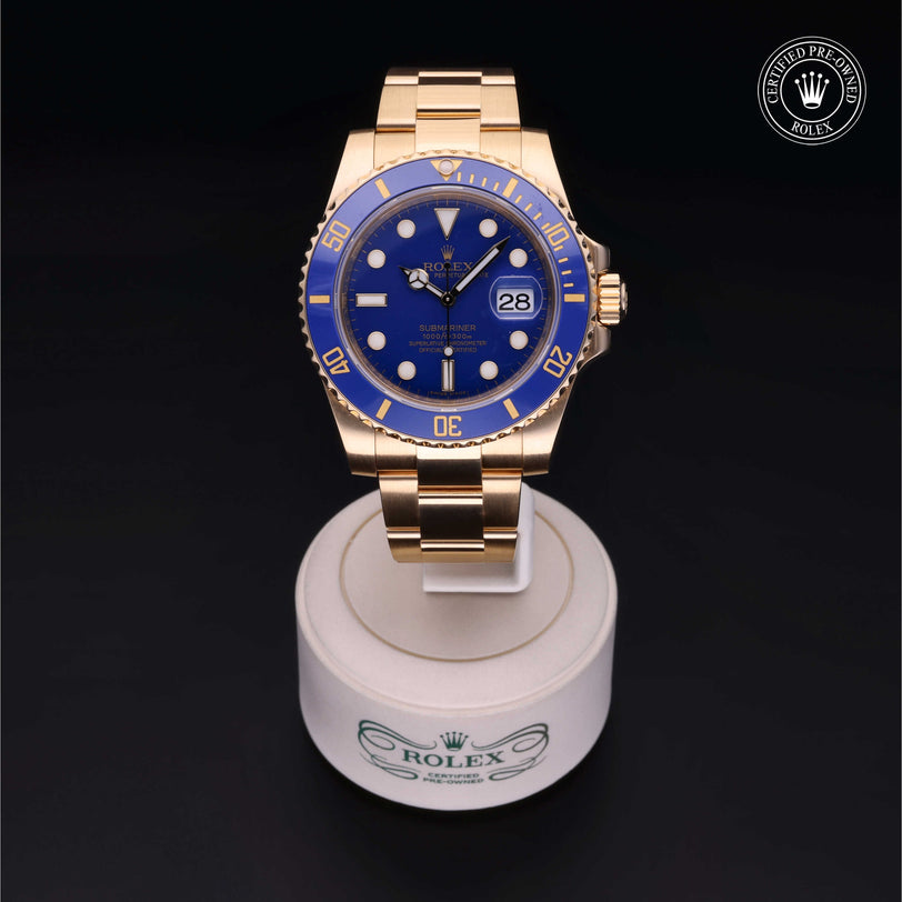 Rolex Certified Pre-owned Submariner M116618LB-0003 front on black background