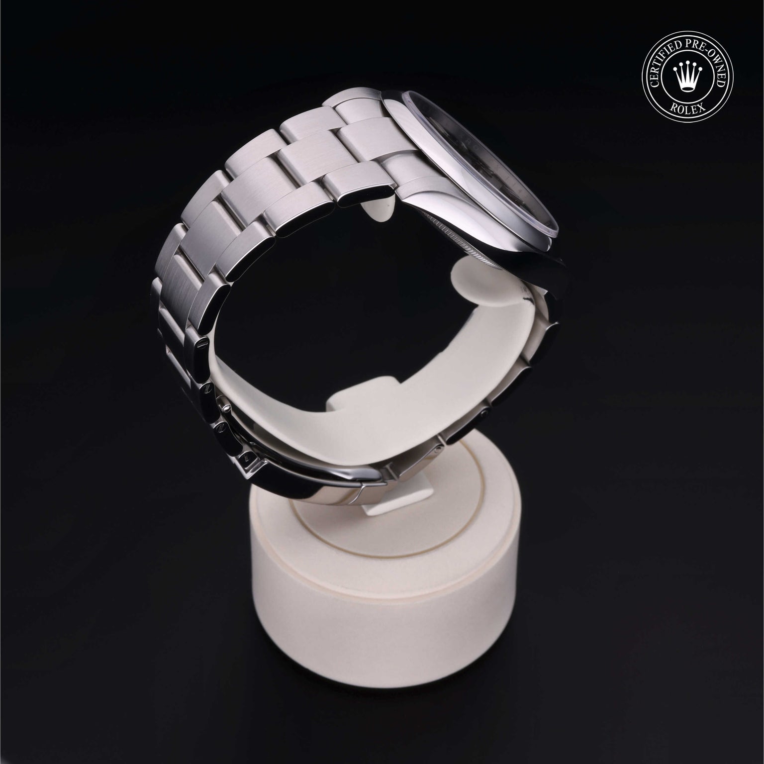 Rolex Certified Pre-owned Oyster Perpetual M124300-0002 front on black background