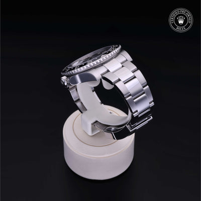 Rolex Certified Pre-owned GMT M116710LN-0001 front on black background