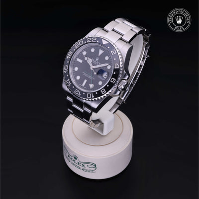 Rolex Certified Pre-owned GMT M116710LN-0001 front on black background