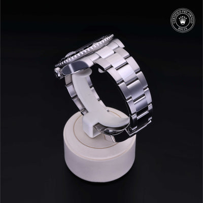 Rolex Certified Pre-owned GMT M116710LN-0001 front on black background
