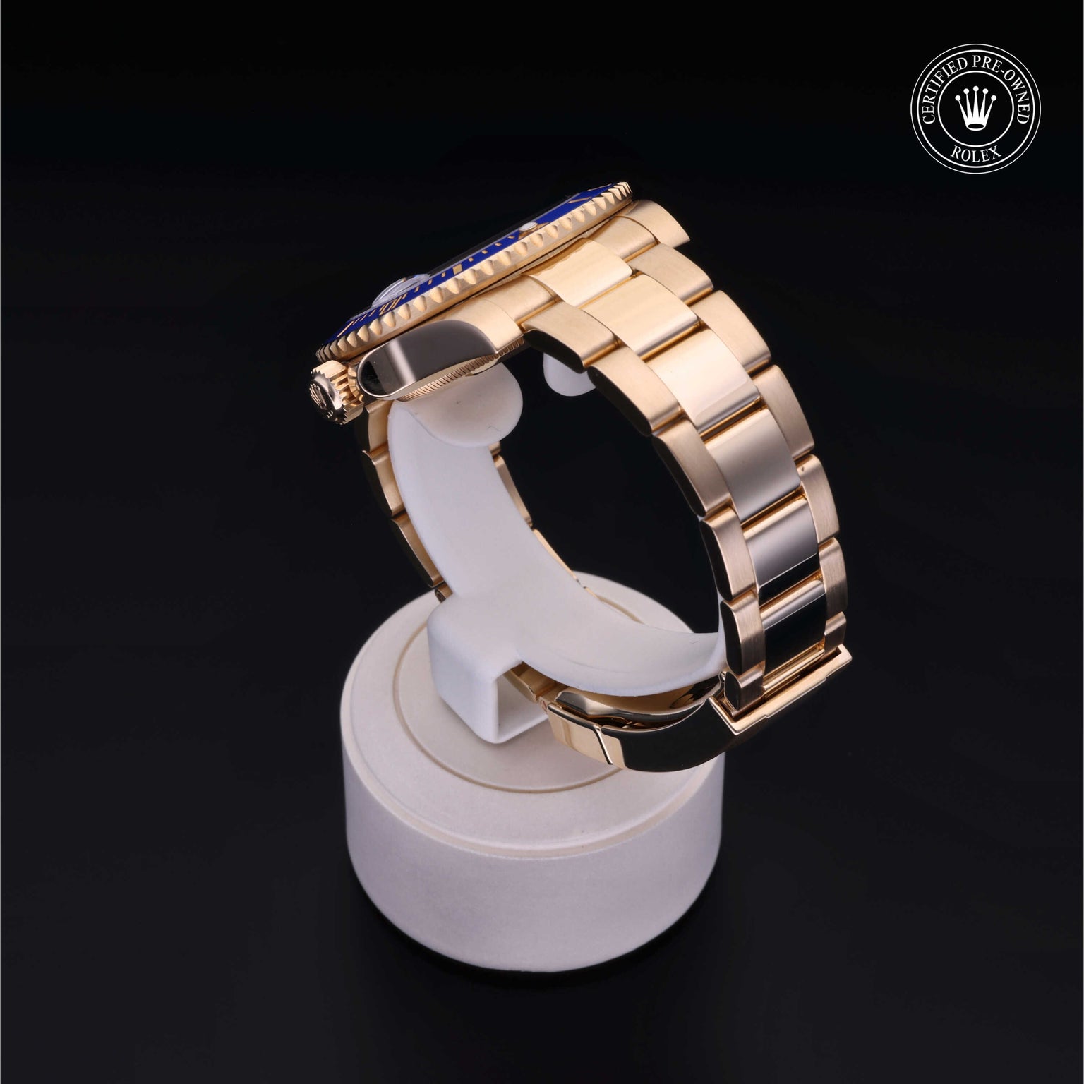 Rolex Certified Pre-owned Submariner M116618LB-0002 front on black background