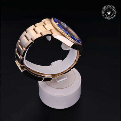 Rolex Certified Pre-owned Submariner M116618LB-0002 front on black background