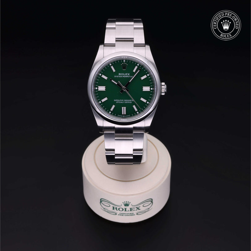 Rolex CPO Oyster Perpetual M126000 front on white background