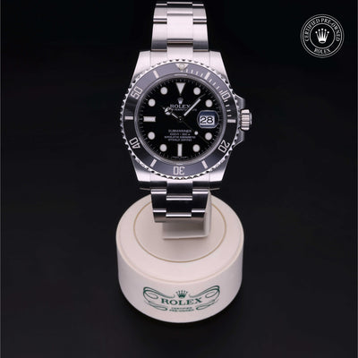 Rolex Certified Pre-owned Submariner M116610LN-0001 front on black background
