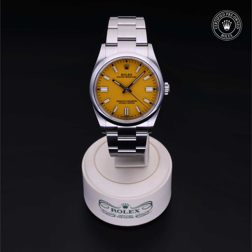 Rolex Certified Pre-owned Oyster Perpetual M126000-0004 front on black background