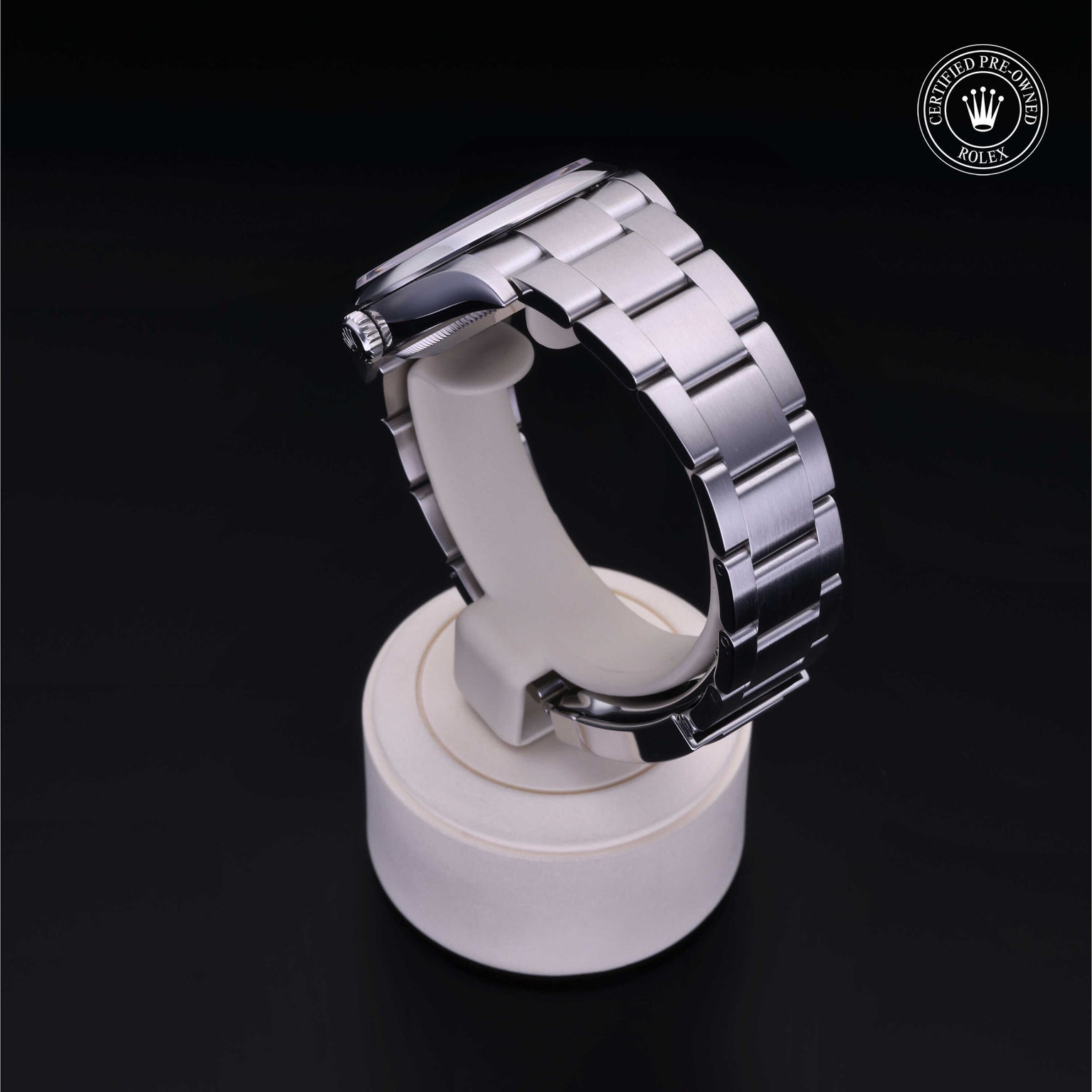 Rolex Certified Pre-owned Oyster Perpetual M126000-0004 front on black background
