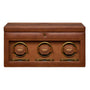 Brown leather watch winder box with three rotating compartments, brass accents, and digital controls on front panel.