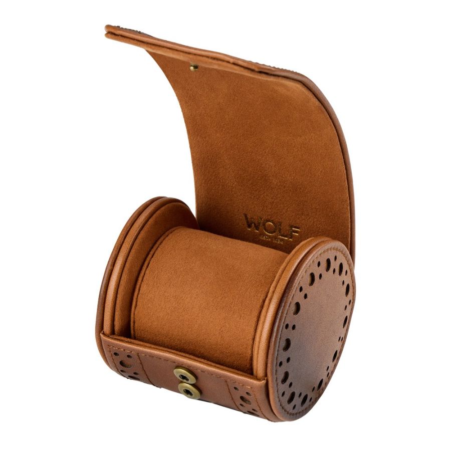 Tan leather watch roll with cylindrical padded center, perforated end cap, and curved flap closure with snap fastener.