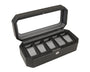 Black watch box with glass top lid, five cushioned compartments inside, and metal lock on front.