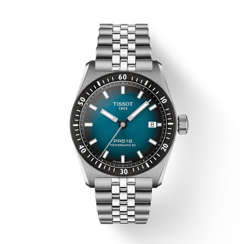 Silver Tissot watch with blue face on a white background