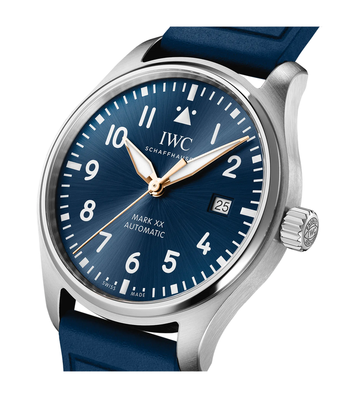 Stainless steel pilot's watch with dark blue dial, white numerals, date window, and blue leather strap.