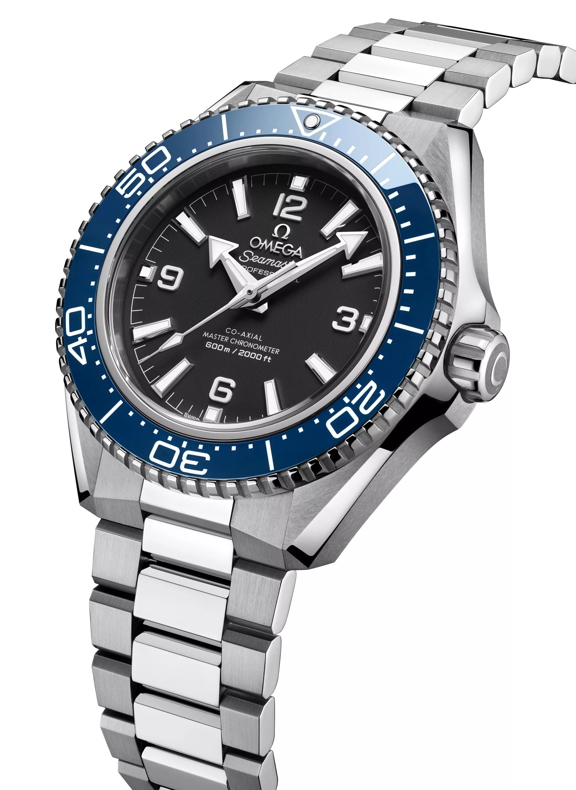 The OMEGA Seamaster Planet Ocean 600mm is a stainless steel dive watch with a blue bezel, black dial, and silver hour markers, shown at an angle to highlight its metal bracelet and Master Chronometer details.