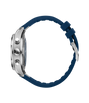 Silver chronograph watch with dark blue dial and navy rubber strap, shown from the side profile.