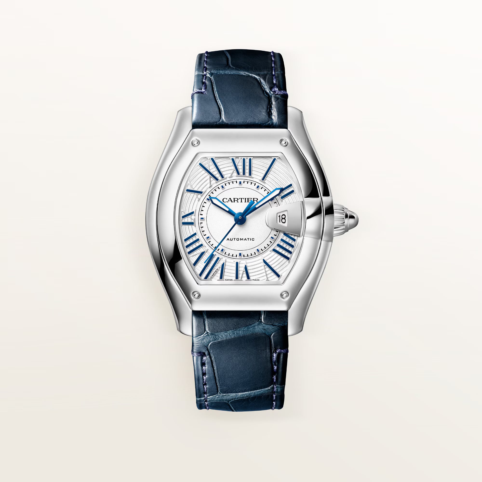 Cartier stainless steel watch with white dial, blue Roman numerals, date window, and dark blue leather strap.