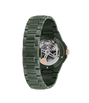 Green ceramic watch with exposed skeleton dial, rose gold accents, and matching bracelet displayed at an angle.