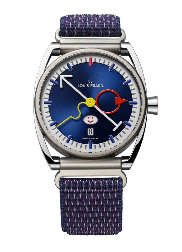 Steel watch with blue dial, colorful hands, smiley face, and dark blue textile strap.